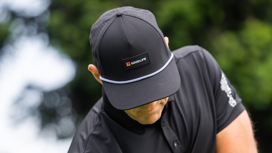 Good Life Golf founder Anthony Moser wearing a performance golf hat in San Diego